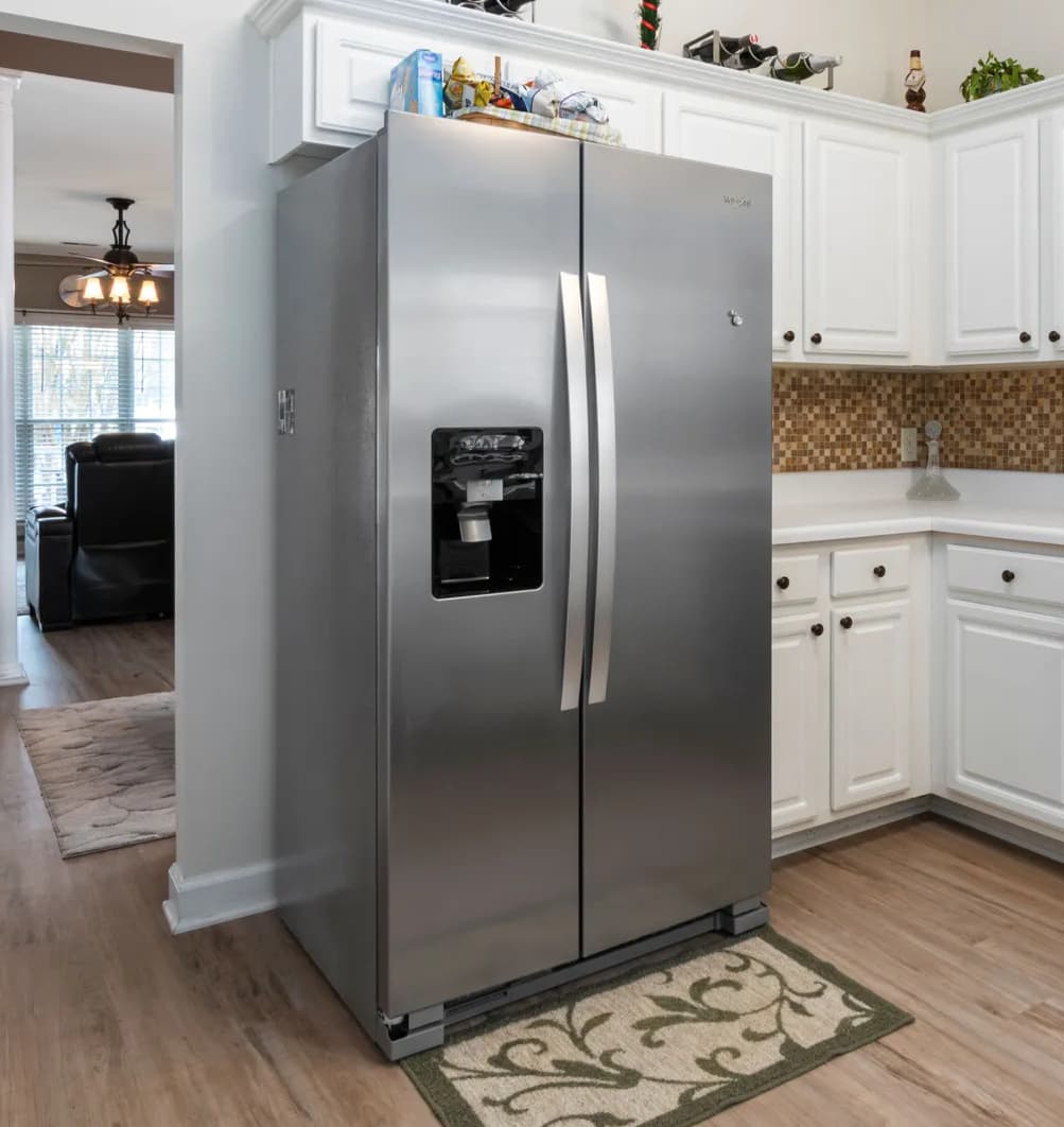 Stainless steel double-door refrigerator in a kitchen